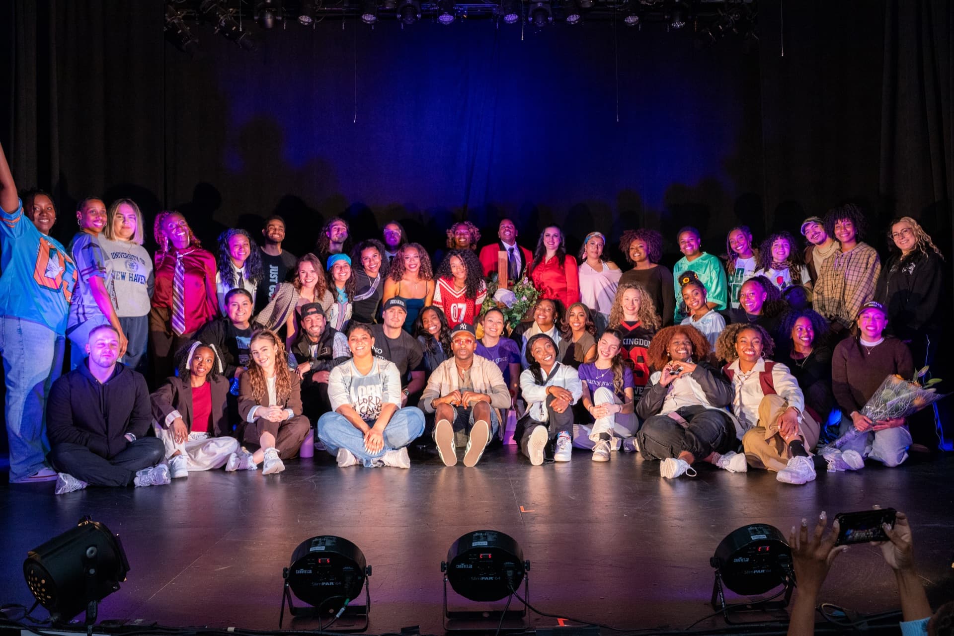 Group of performers on stage